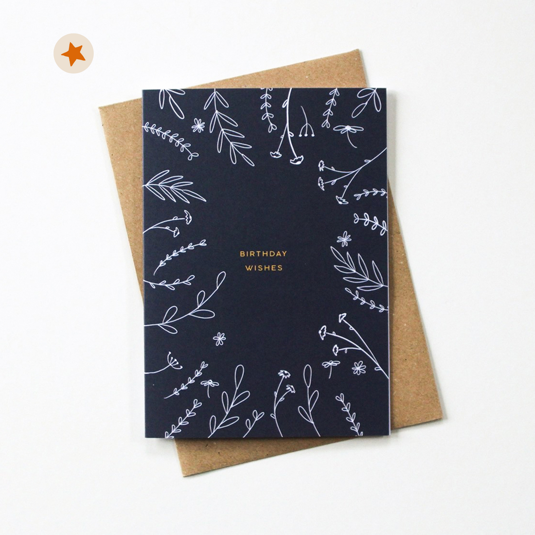 Navy card with doodled plant branches and the words &quot;Birthday Wishes&quot;