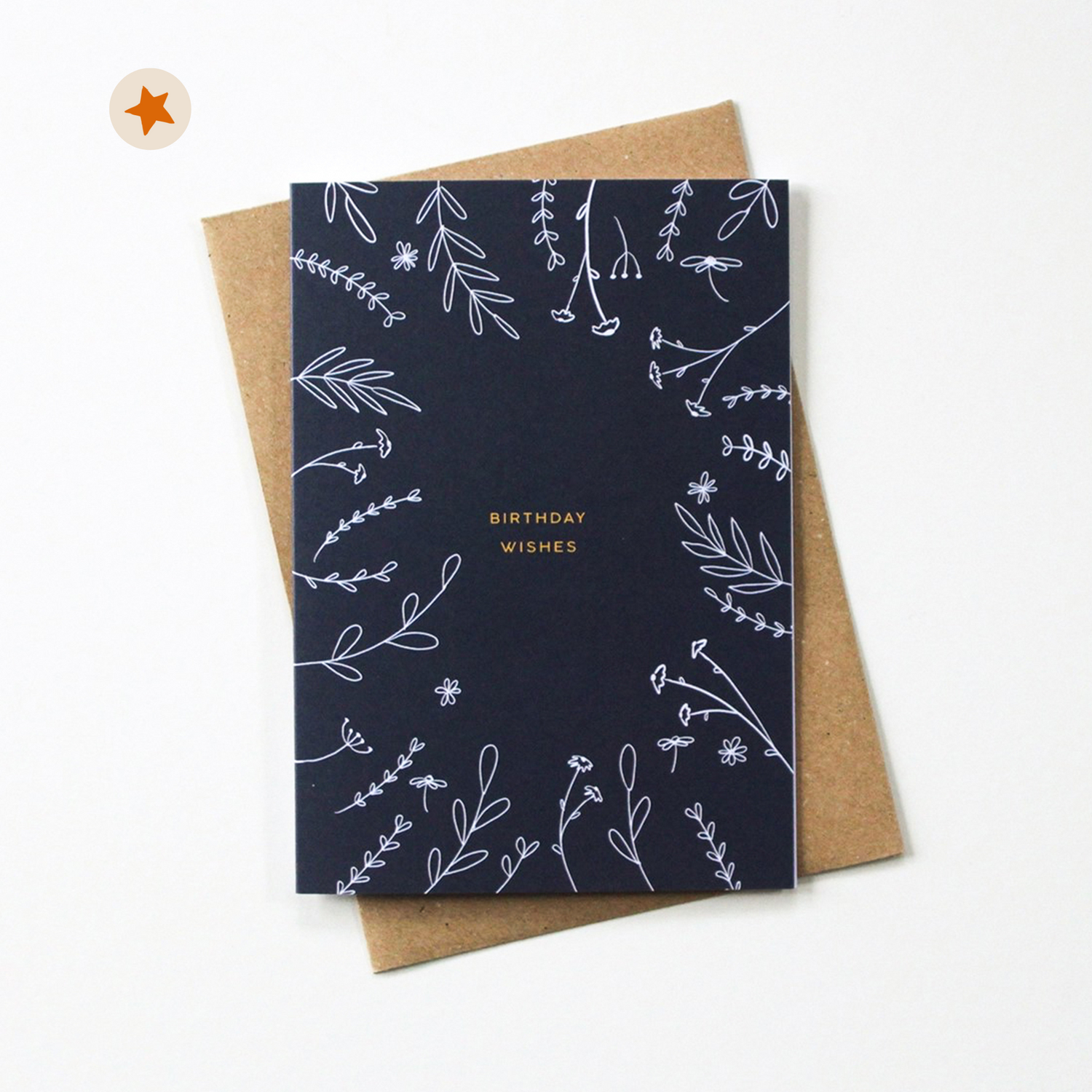 Navy card with doodled plant branches and the words &quot;Birthday Wishes&quot;