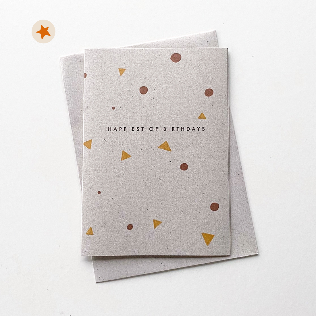 Minimalist card with brown dots and mustard triangles and the words &quot;Happiest of Birthdays&quot;