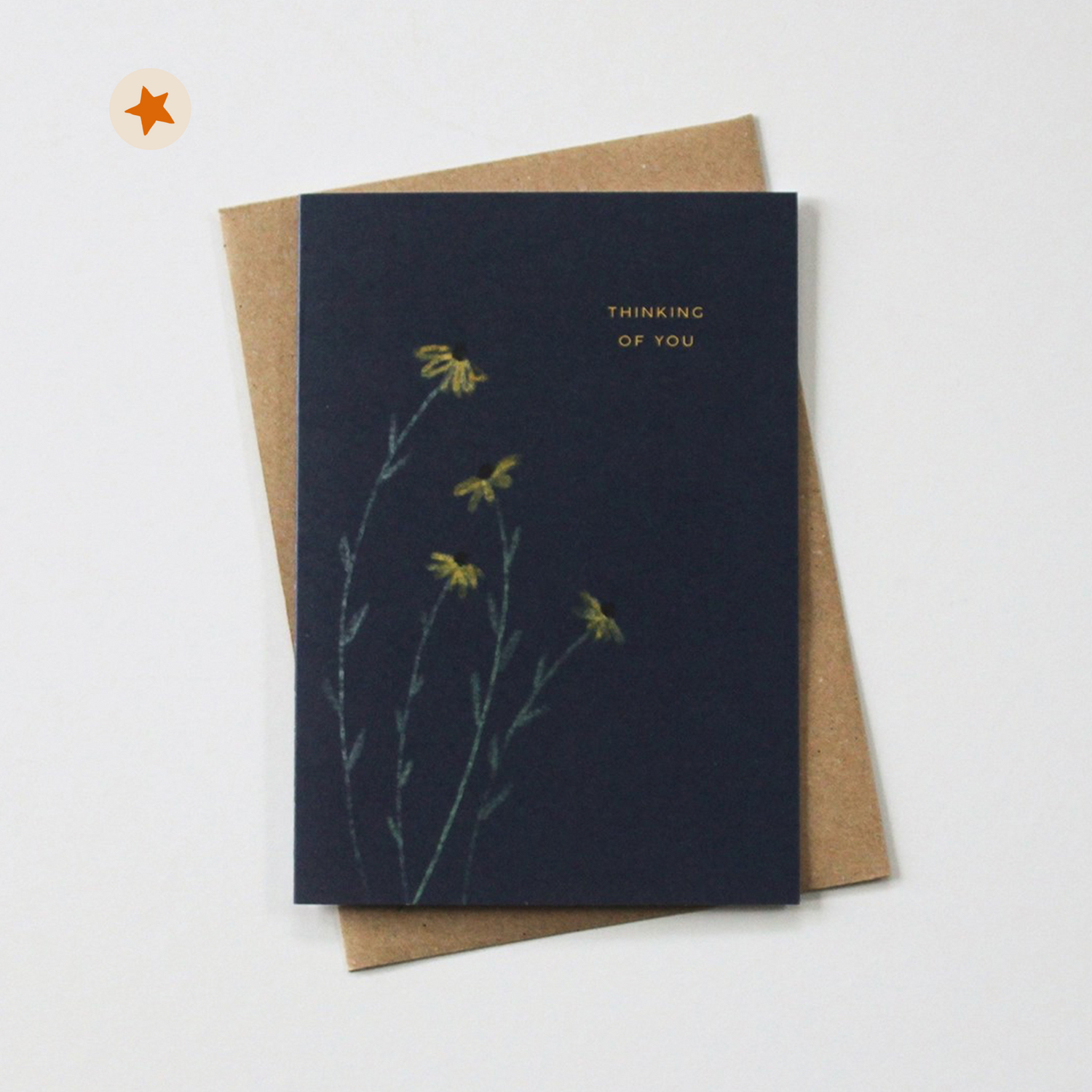 Navy card with painted yellow flowers and the words &quot;Thinking of you&quot;