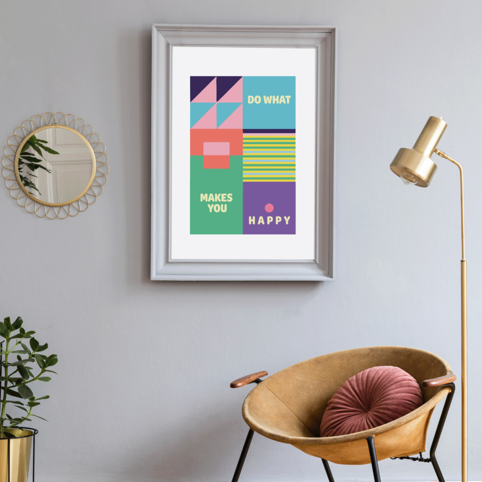 Frame on a wall with an illustration of abstract geometric patterns with green, purple, orange, pink and blue and the word &quot;Do what makes you happy&quot;