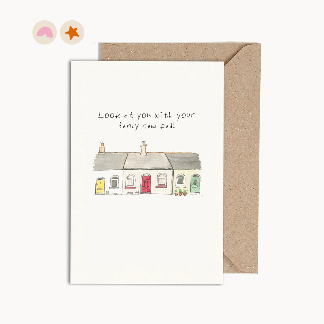 Card with an illustration of a typical small one story terraced white house with a red door. It says &quot;Look at you with your fancy new pad!&quot;